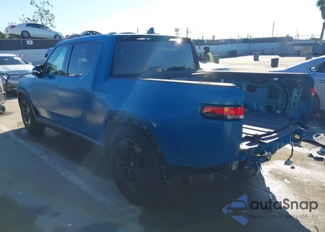 2022 Rivian R1T Adventure from USA, damaged, VIN 7FCTGAAA4NN010721